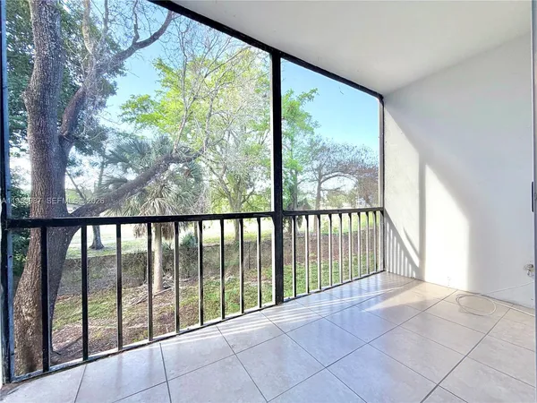 a view of a large window with an outdoor space