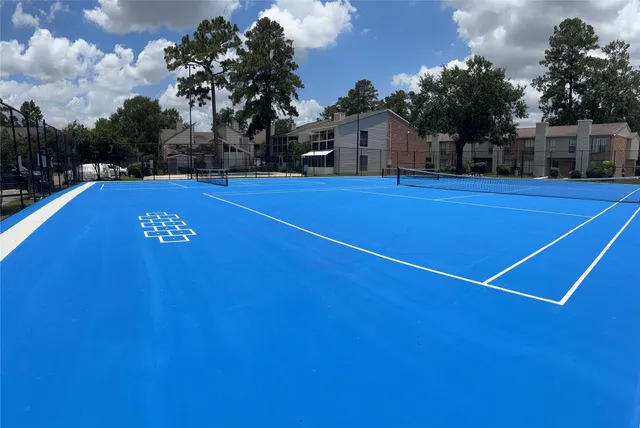 a view of outdoor space and basketball court