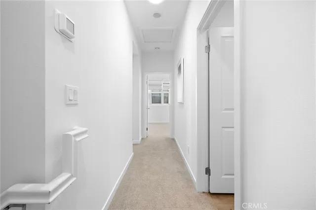 a view of a hallway with closet