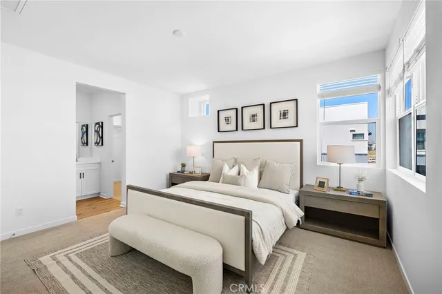 a bedroom with a bed and a couch