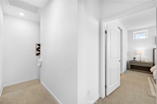 a view of a bedroom from hallway