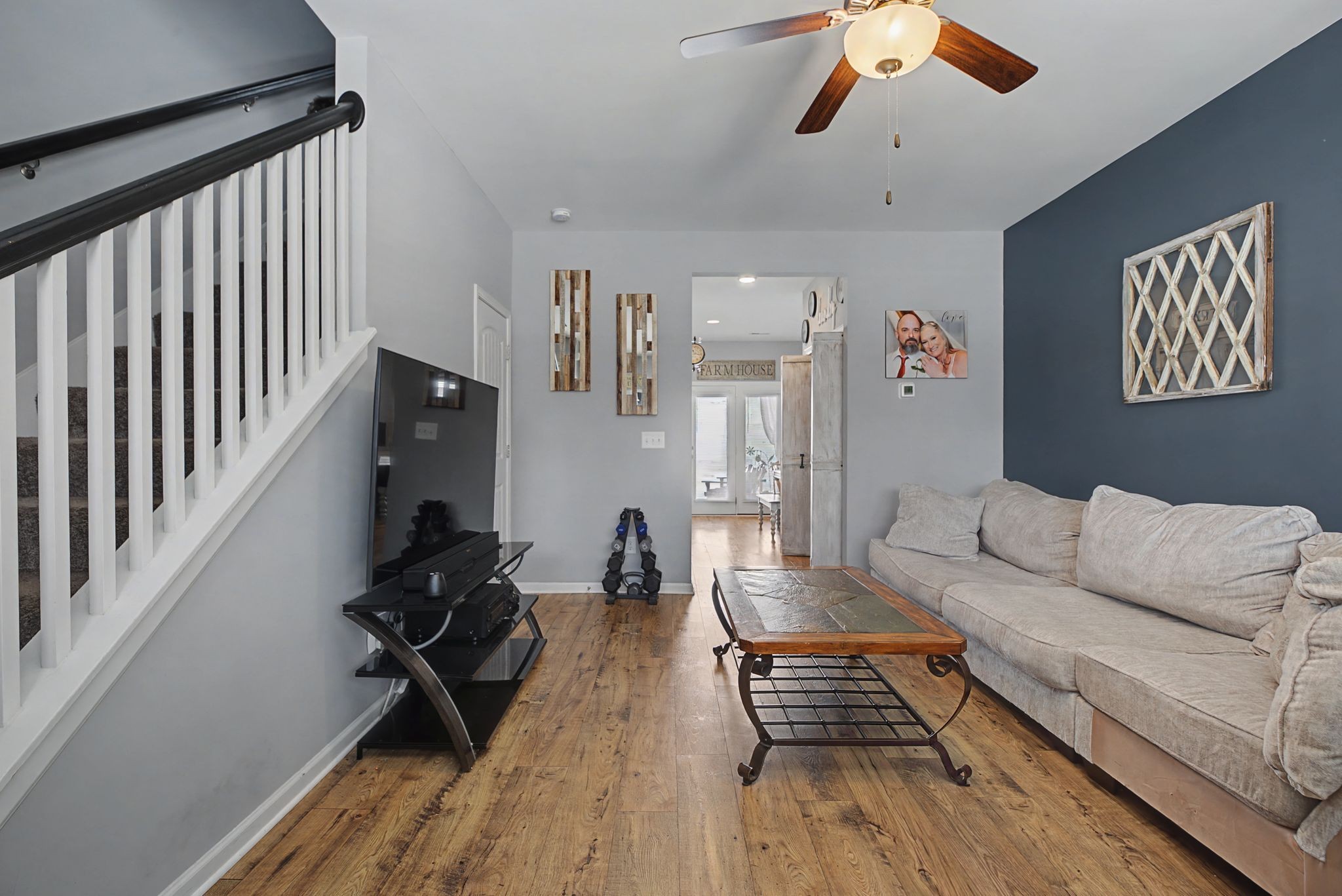 202 Bell Forge Court White Bluff, TN 37187 - Photo 3 of 16 a living room with furniture and a wooden floor