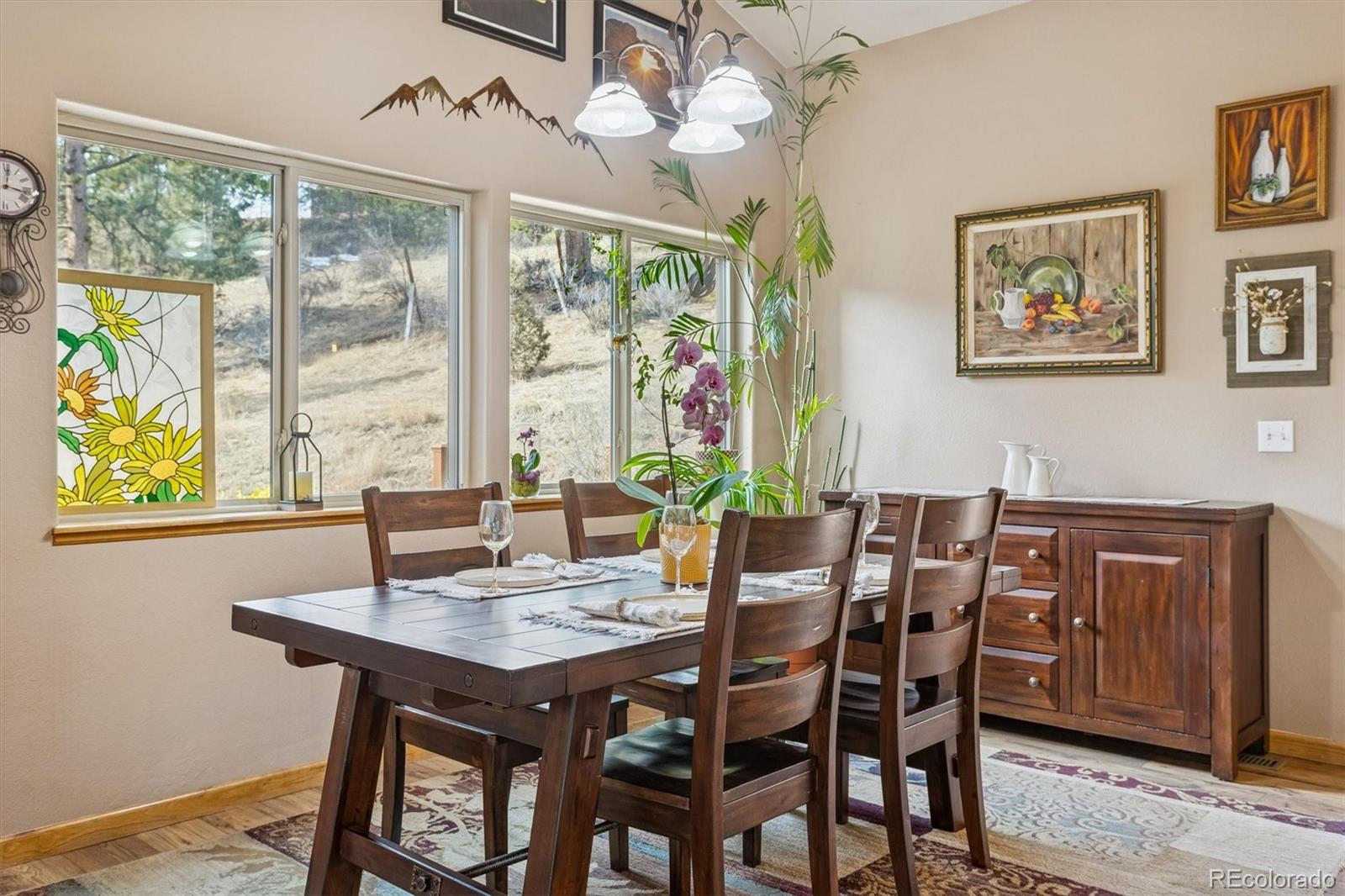 2230 County Road 72 Bailey, CO 80421 - Photo 16 of 50 a view of a dining room with furniture window and outside view