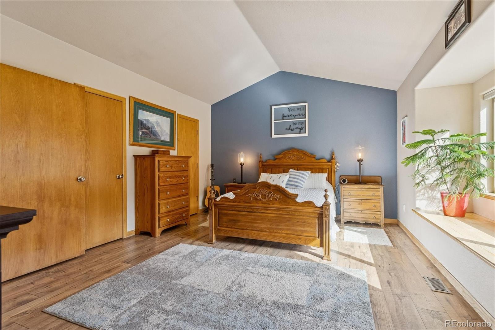 2230 County Road 72 Bailey, CO 80421 - Photo 18 of 50 a bedroom with a bed and a window