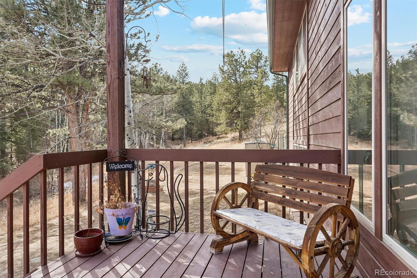 2230 County Road 72 Bailey, CO 80421 - Photo 29 of 50 a view of a chairs on the roof deck