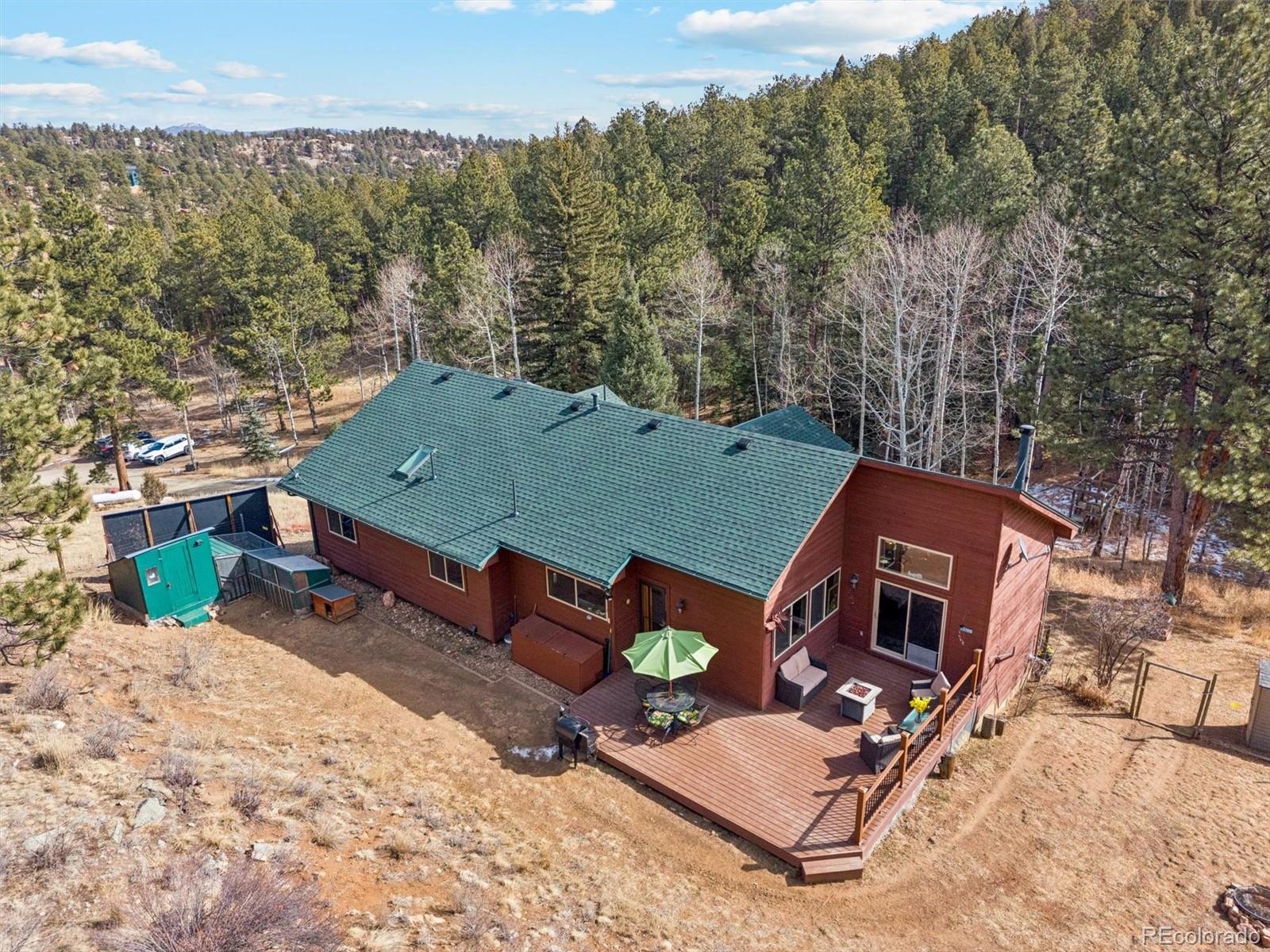 2230 County Road 72 Bailey, CO 80421 - Photo 43 of 50 an aerial view of a house with outdoor space
