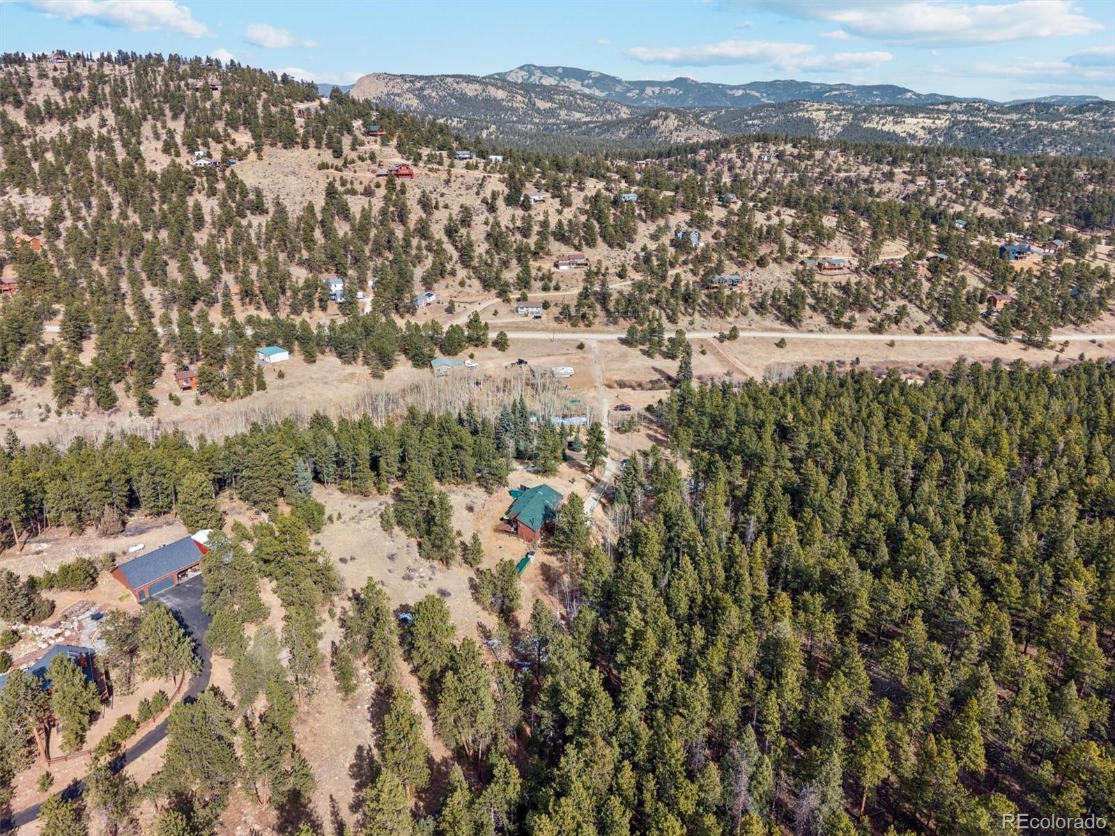 2230 County Road 72 Bailey, CO 80421 - Photo 44 of 50 a view of a city with mountain