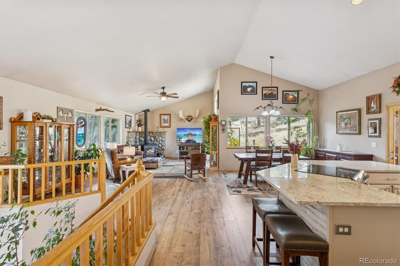 2230 County Road 72 Bailey, CO 80421 - Photo 7 of 50 a view of a dining room with furniture window and wooden floor