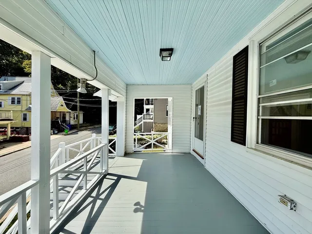 a view of a living room with furniture