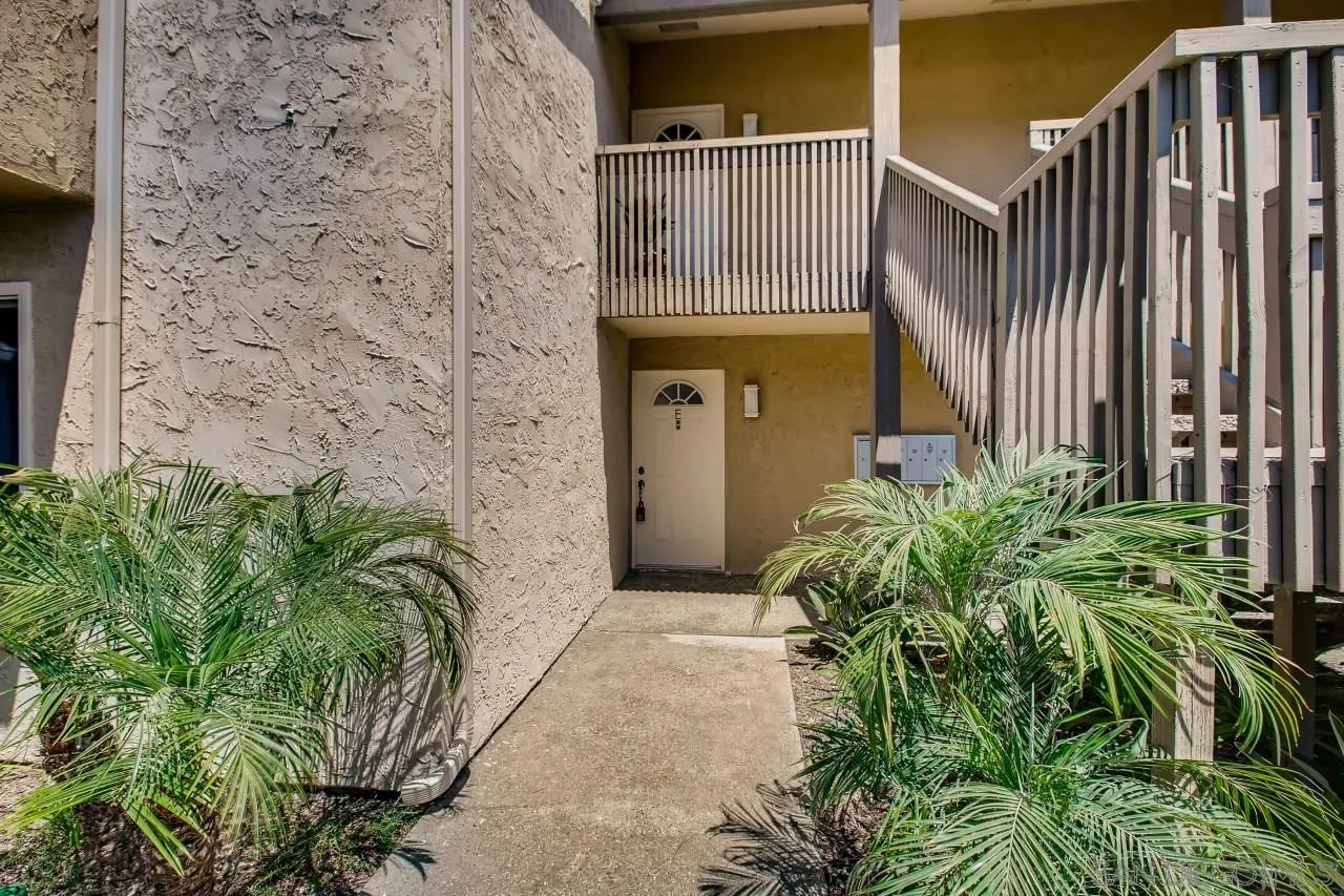 a view of a entrance with stairs
