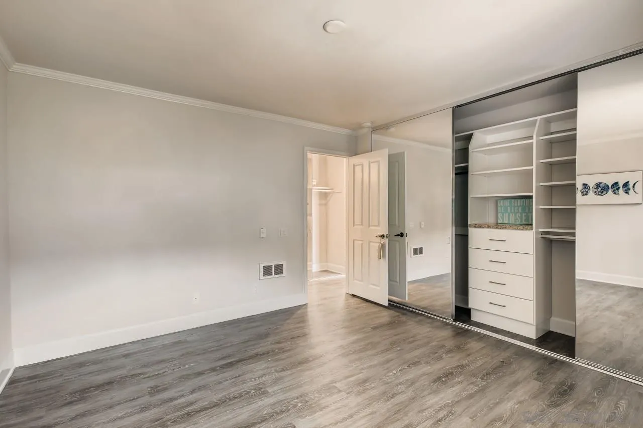 8524 Via Mallorca, Unit E La Jolla, CA 92037 - Photo 10 of 14 wooden floor in an empty room