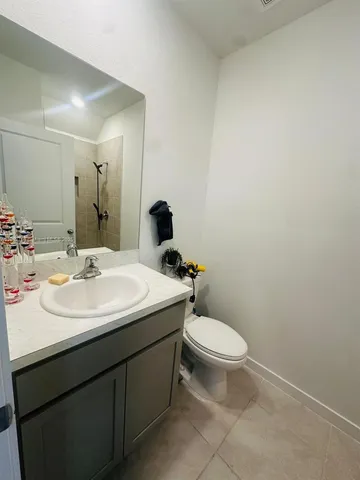 a bathroom with a sink and a toilet