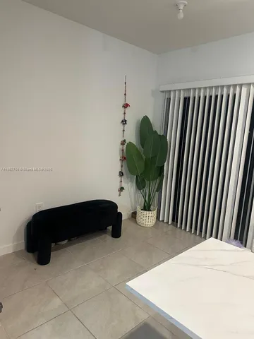 a close view of a potted plant sitting in kitchen with a potted plant
