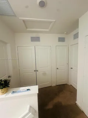 a bathroom with a sink a toilet and a shower