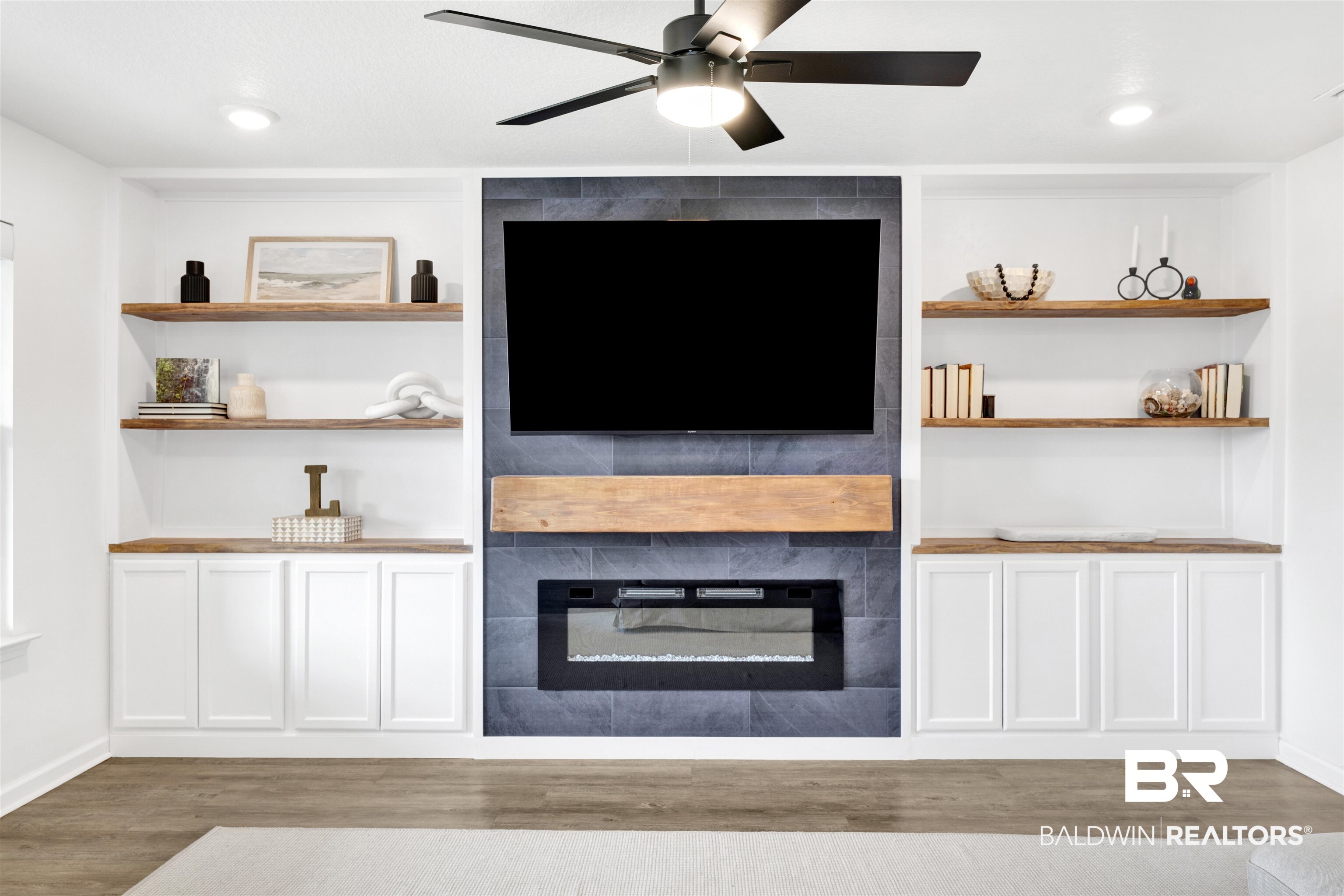 10763 Paget Drive North Mobile, AL 36608 - Photo 9 of 24 Unfurnished living room featuring a fireplace, ceiling fan, dark wood-style floors, and recessed lighting