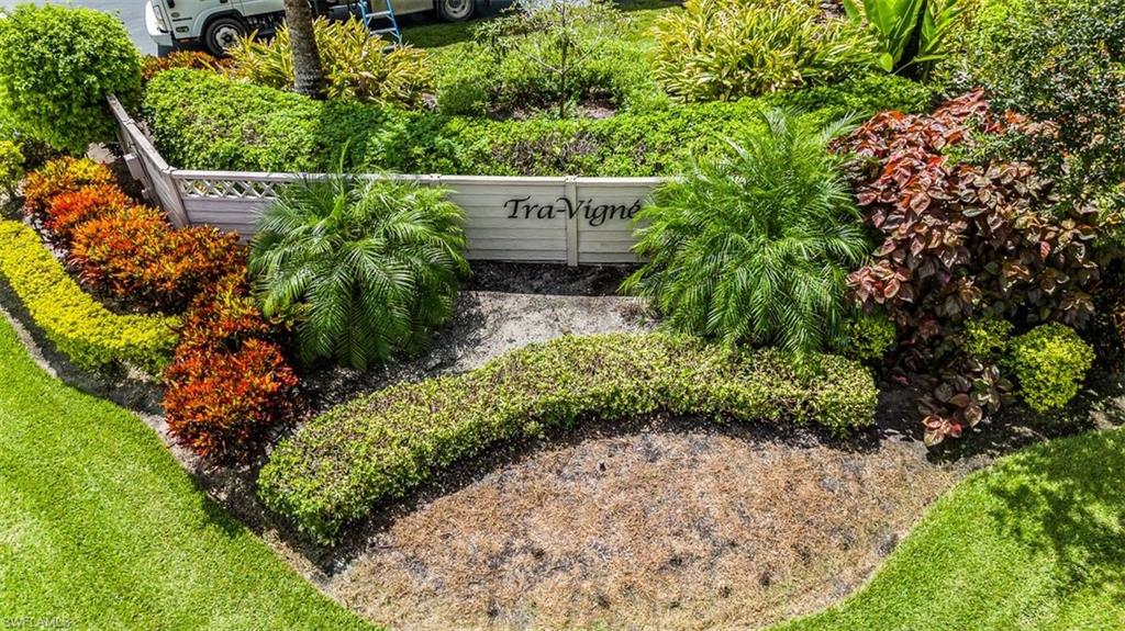 164 Via Perignon, Unit 84 Naples, FL 34119 - Photo 4 of 34 a view of a garden