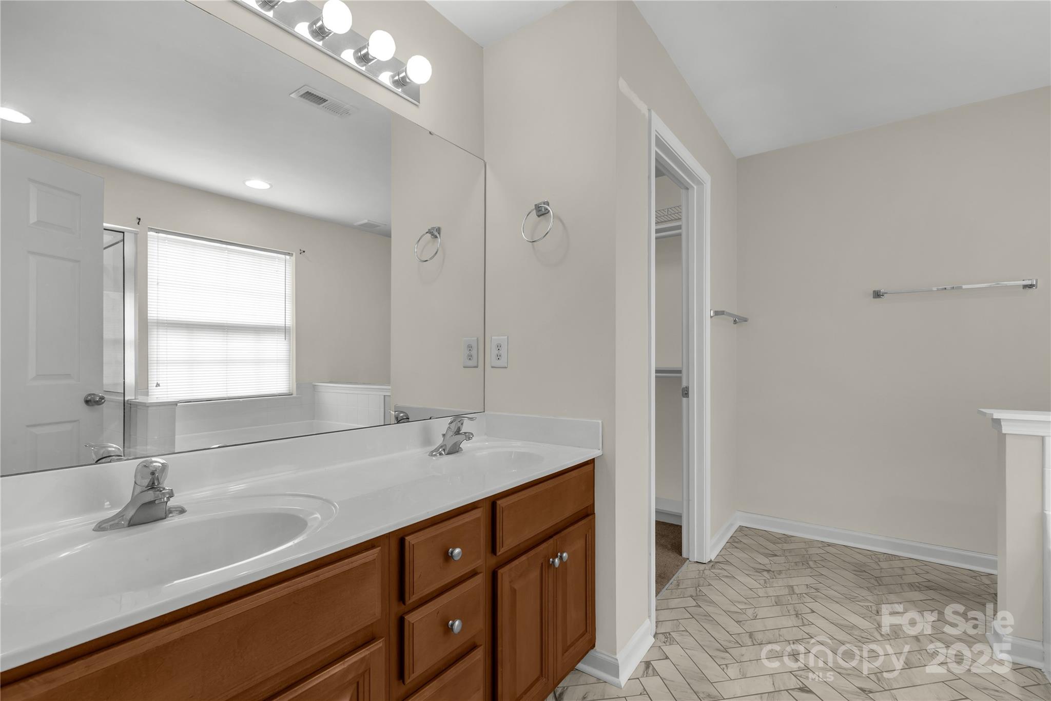 187 Snead Road Fort Mill, SC 29715 - Photo 17 of 32 a bathroom with a sink double vanity and a mirror