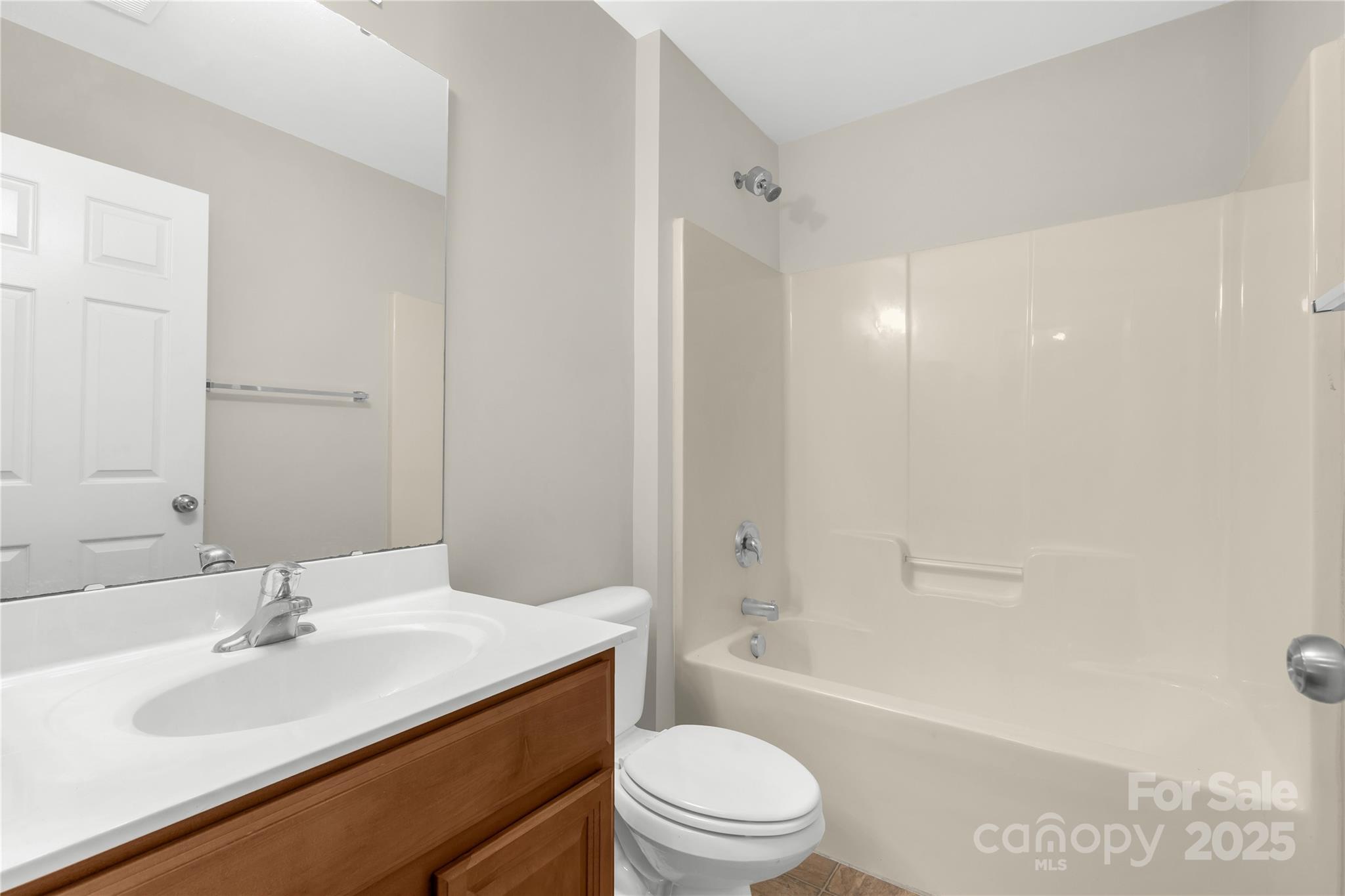 187 Snead Road Fort Mill, SC 29715 - Photo 23 of 32 a bathroom with a sink a toilet and shower