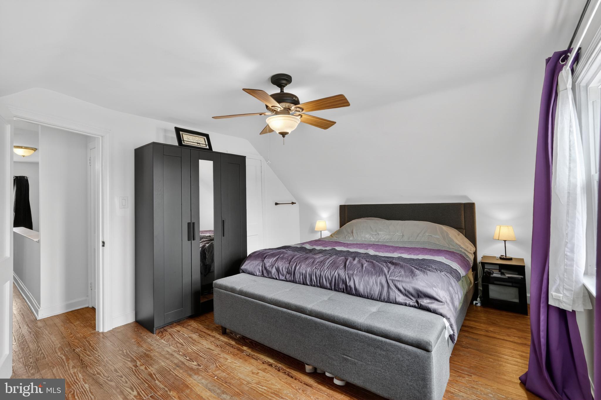 518 Bonsall Road Ridley Park, PA 19078 - Photo 18 of 31 a bedroom with a bed and a chandelier