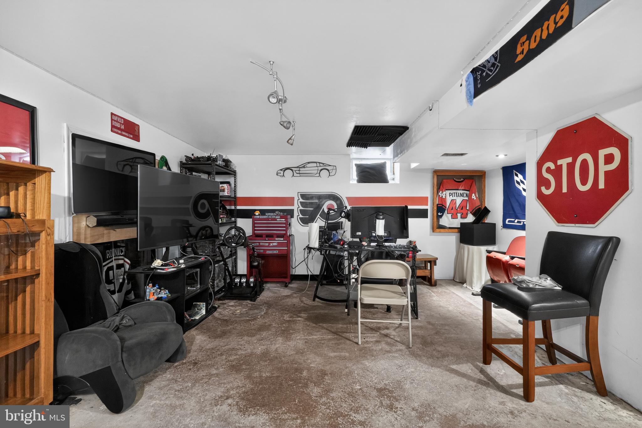 518 Bonsall Road Ridley Park, PA 19078 - Photo 23 of 31 a living room with furniture and a flat screen tv