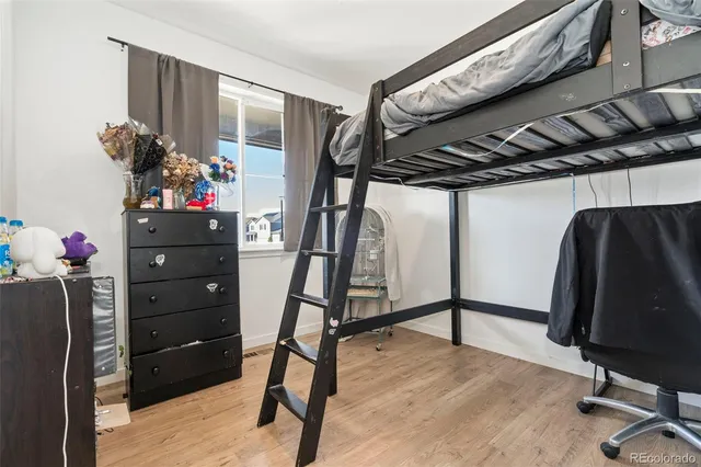 a view of a entryway with wooden floor