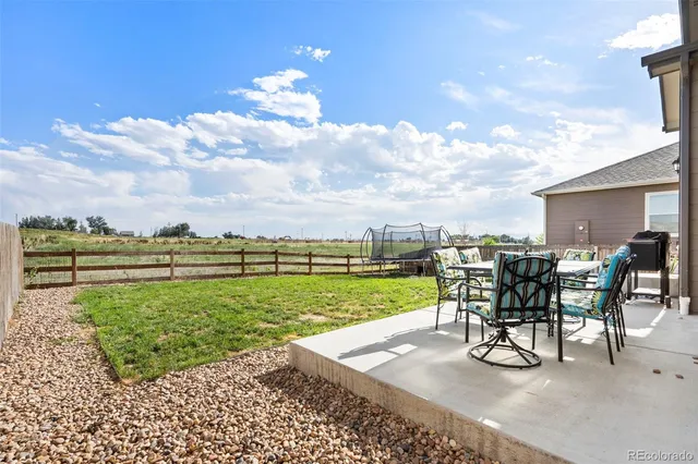 a view of a terrace with chairs