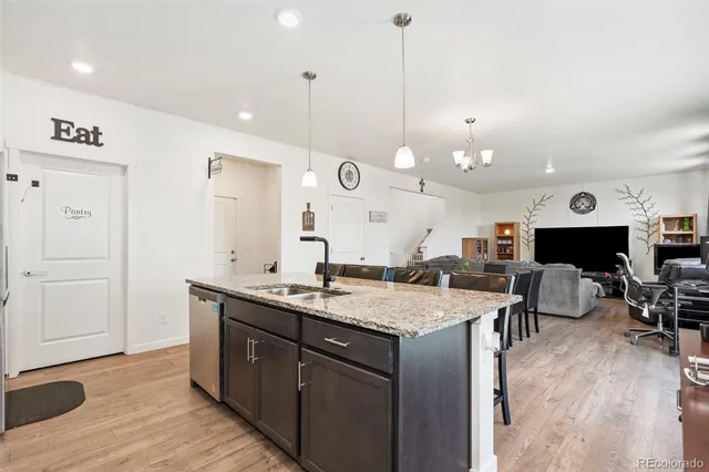 a kitchen with a table and chairs in it