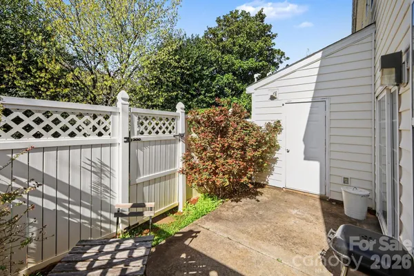 a view of a brick wall of the house