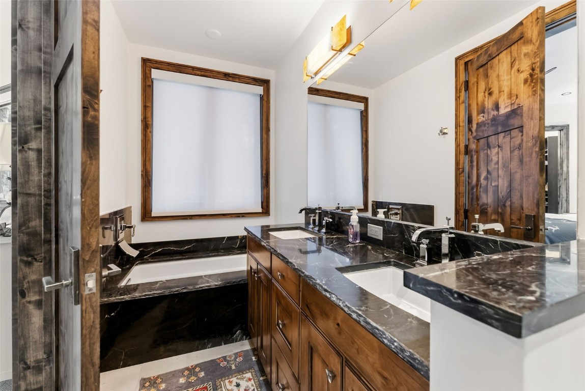 111 Brooks Snider Road Breckenridge, CO 80424 - Photo 19 of 44 a kitchen with sink stove and cabinets
