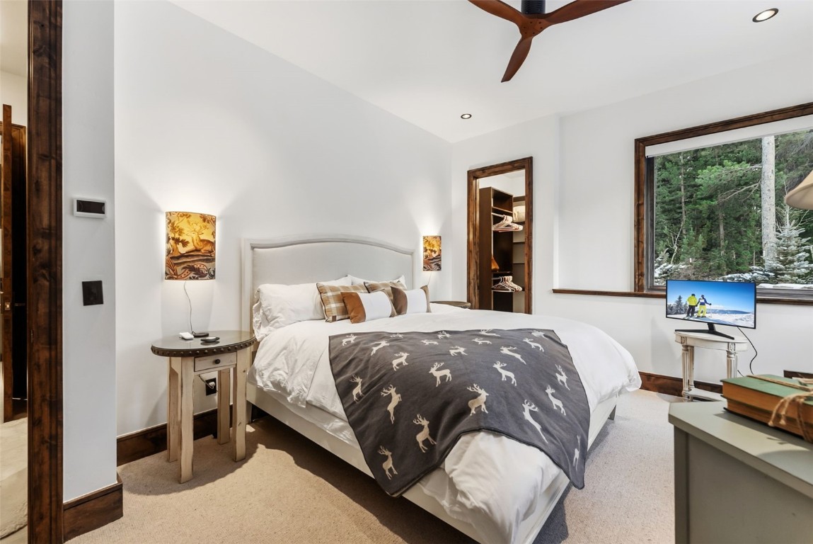 111 Brooks Snider Road Breckenridge, CO 80424 - Photo 20 of 44 a bedroom with a bed and wooden floor