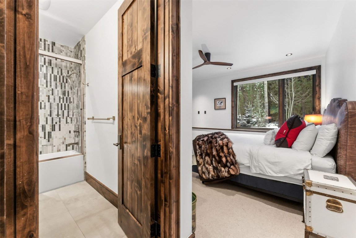 111 Brooks Snider Road Breckenridge, CO 80424 - Photo 26 of 44 a bedroom with a bed and a window