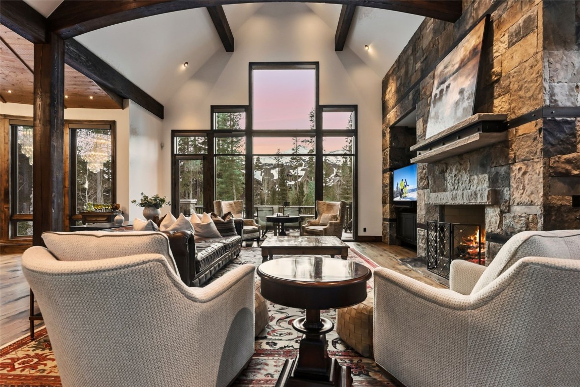 111 Brooks Snider Road Breckenridge, CO 80424 - Photo 3 of 44 a living room with fireplace furniture and a large window