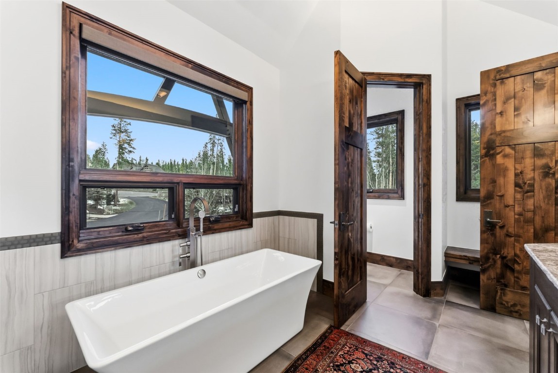 111 Brooks Snider Road Breckenridge, CO 80424 - Photo 31 of 44 a bathroom with a bathtub and a shower