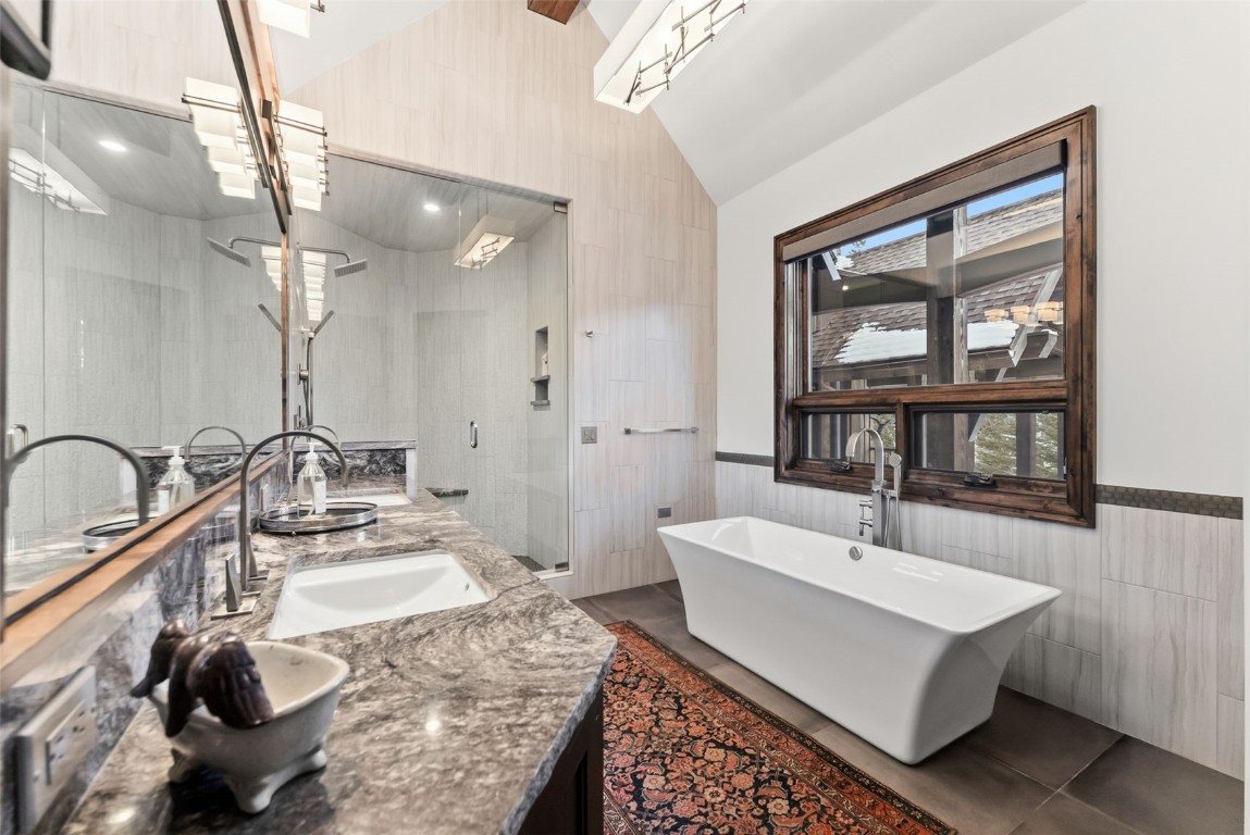 111 Brooks Snider Road Breckenridge, CO 80424 - Photo 32 of 44 a bathroom with a sink and a mirror