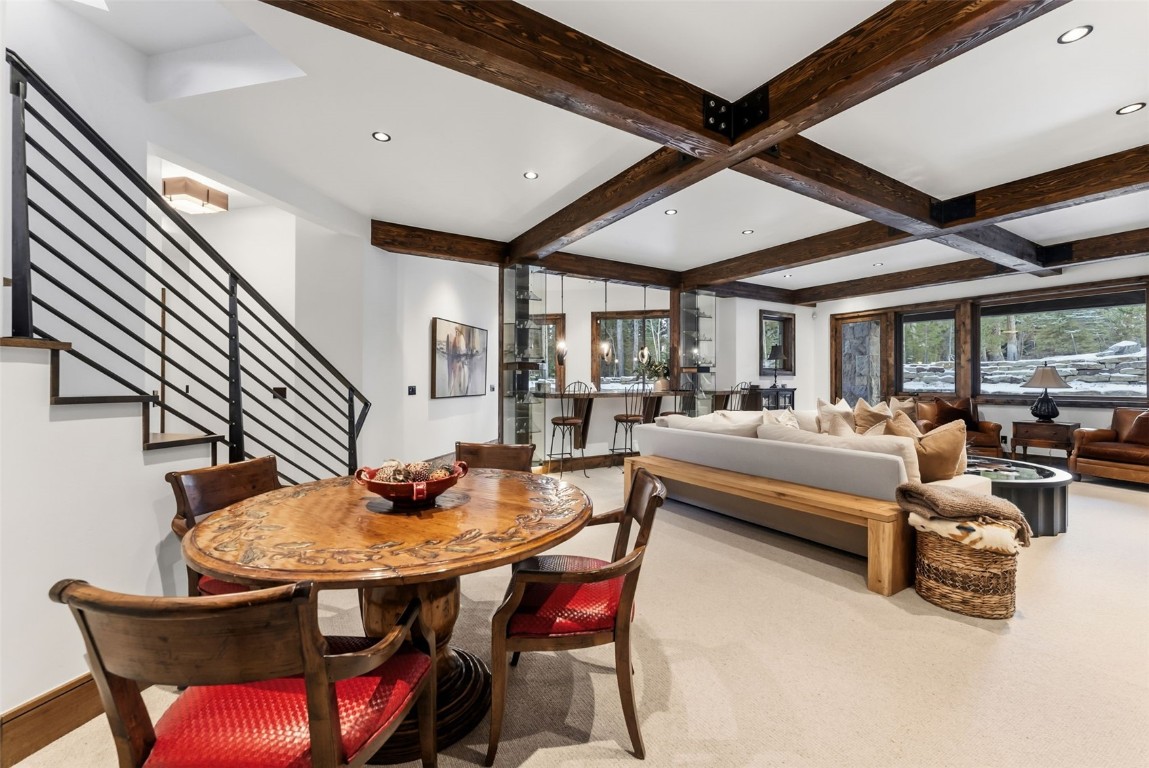 111 Brooks Snider Road Breckenridge, CO 80424 - Photo 36 of 44 a dining room with furniture and a livingroom