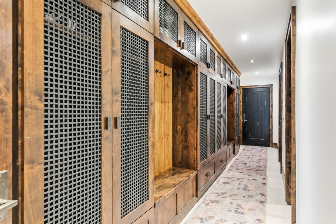 111 Brooks Snider Road Breckenridge, CO 80424 - Photo 42 of 44 a view of a hallway with wooden floor