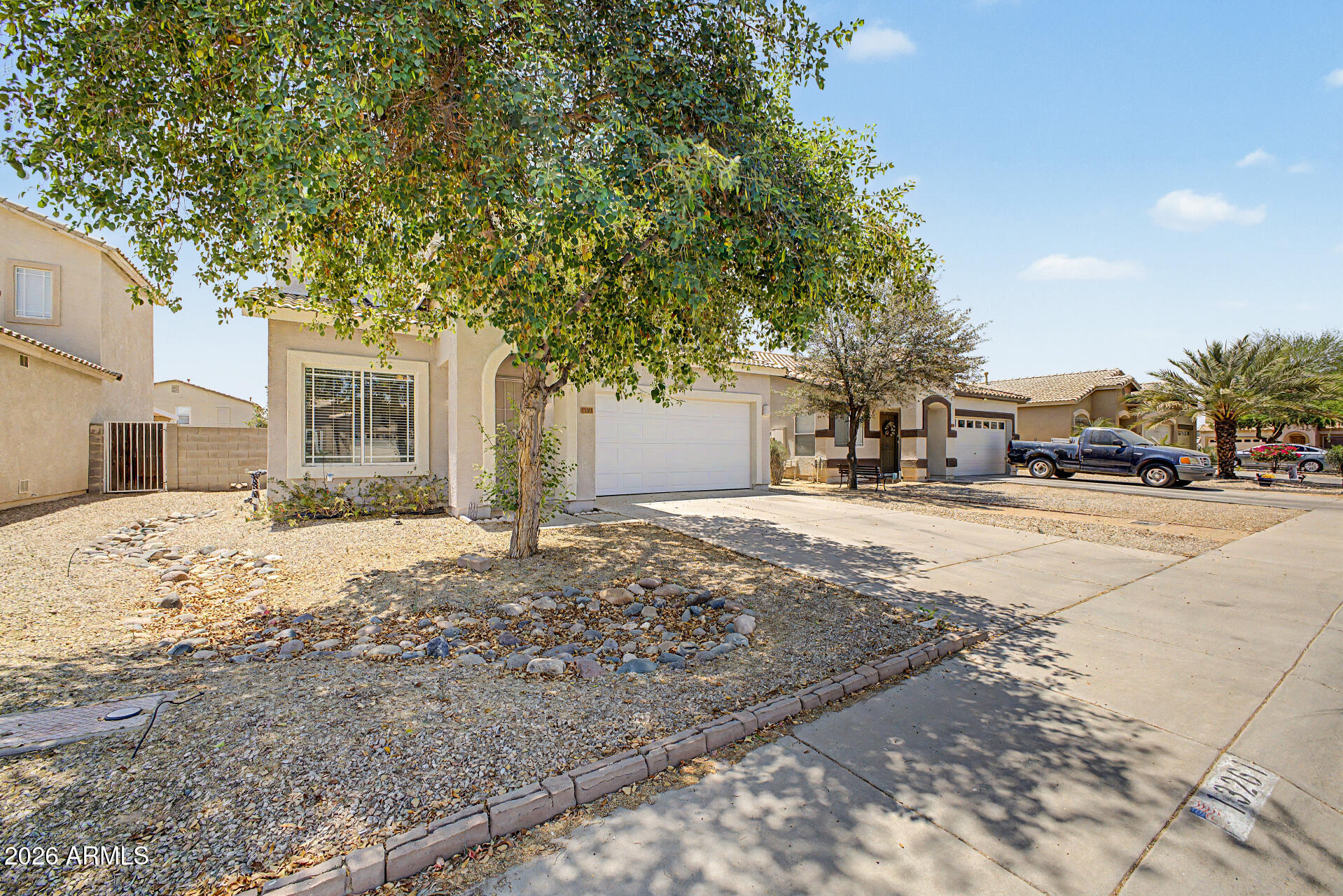 13261 West Redfield Road Surprise, AZ 85379 - Photo 2 of 36 a view of road with card board