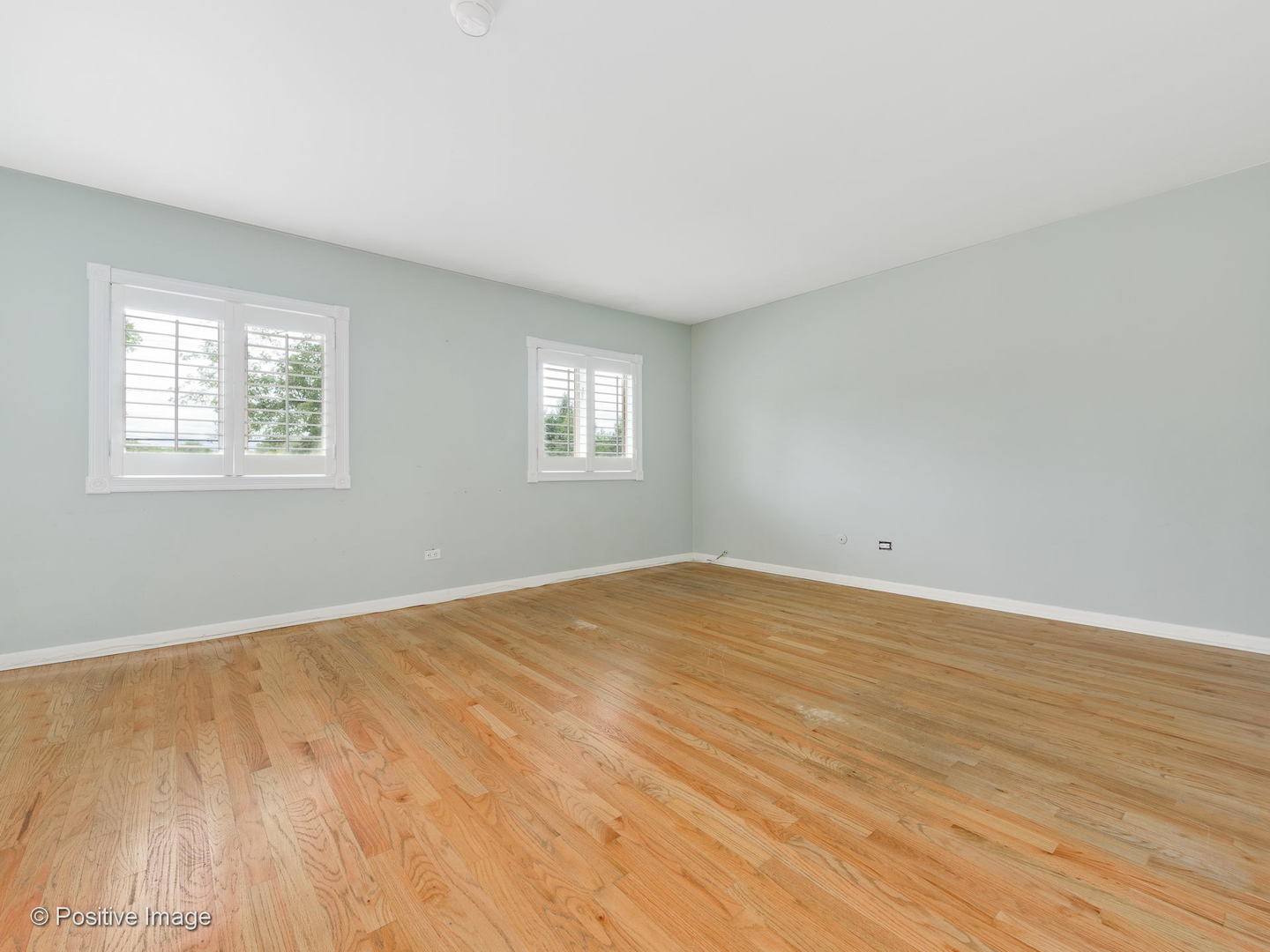757 Ridge Road Highland Park, IL 60035 - Photo 12 of 26 a view of empty room with wooden floor and fan