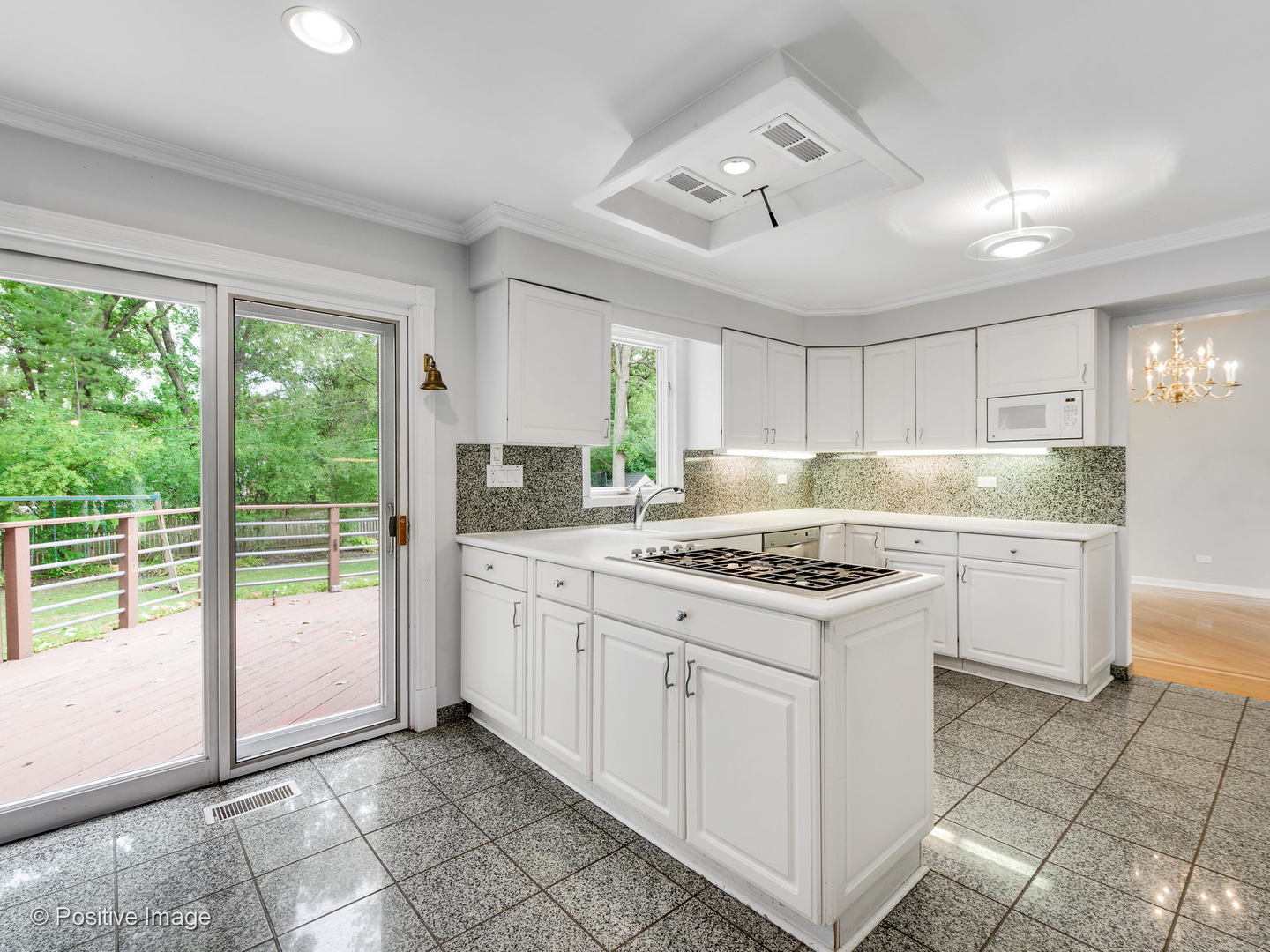 757 Ridge Road Highland Park, IL 60035 - Photo 7 of 26 a kitchen with granite countertop a stove a sink dishwasher and a refrigerator