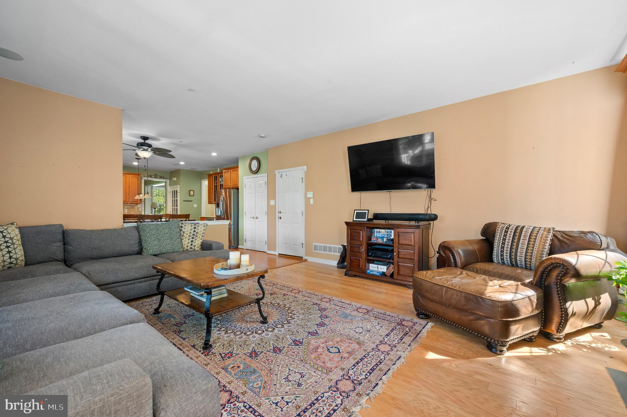 210 Main Street Newtown Square, PA 19073 - Photo 14 of 43 a living room with furniture and a flat screen tv