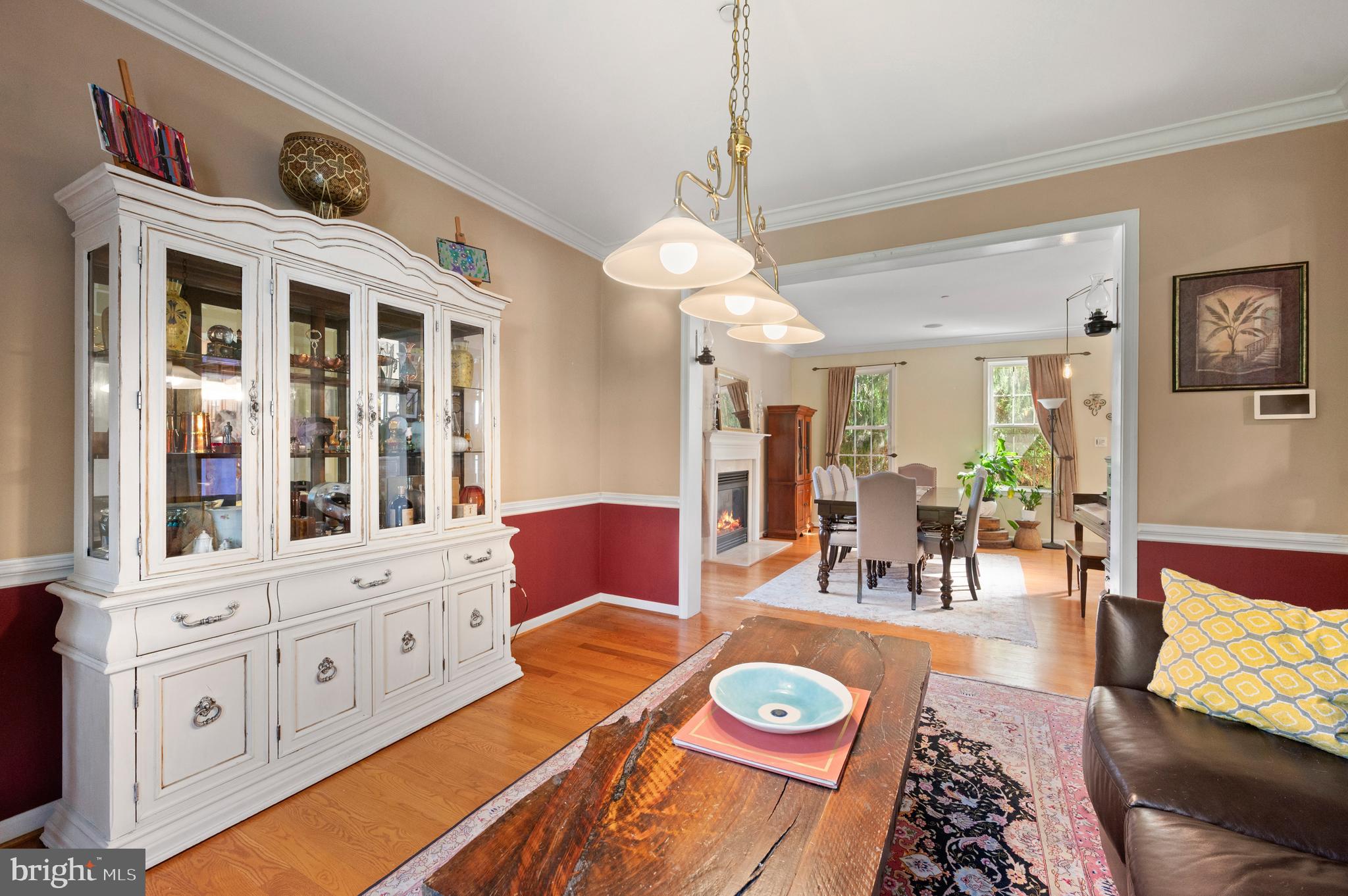 210 Main Street Newtown Square, PA 19073 - Photo 19 of 43 a view of a dining room with furniture a chandelier and wooden floor