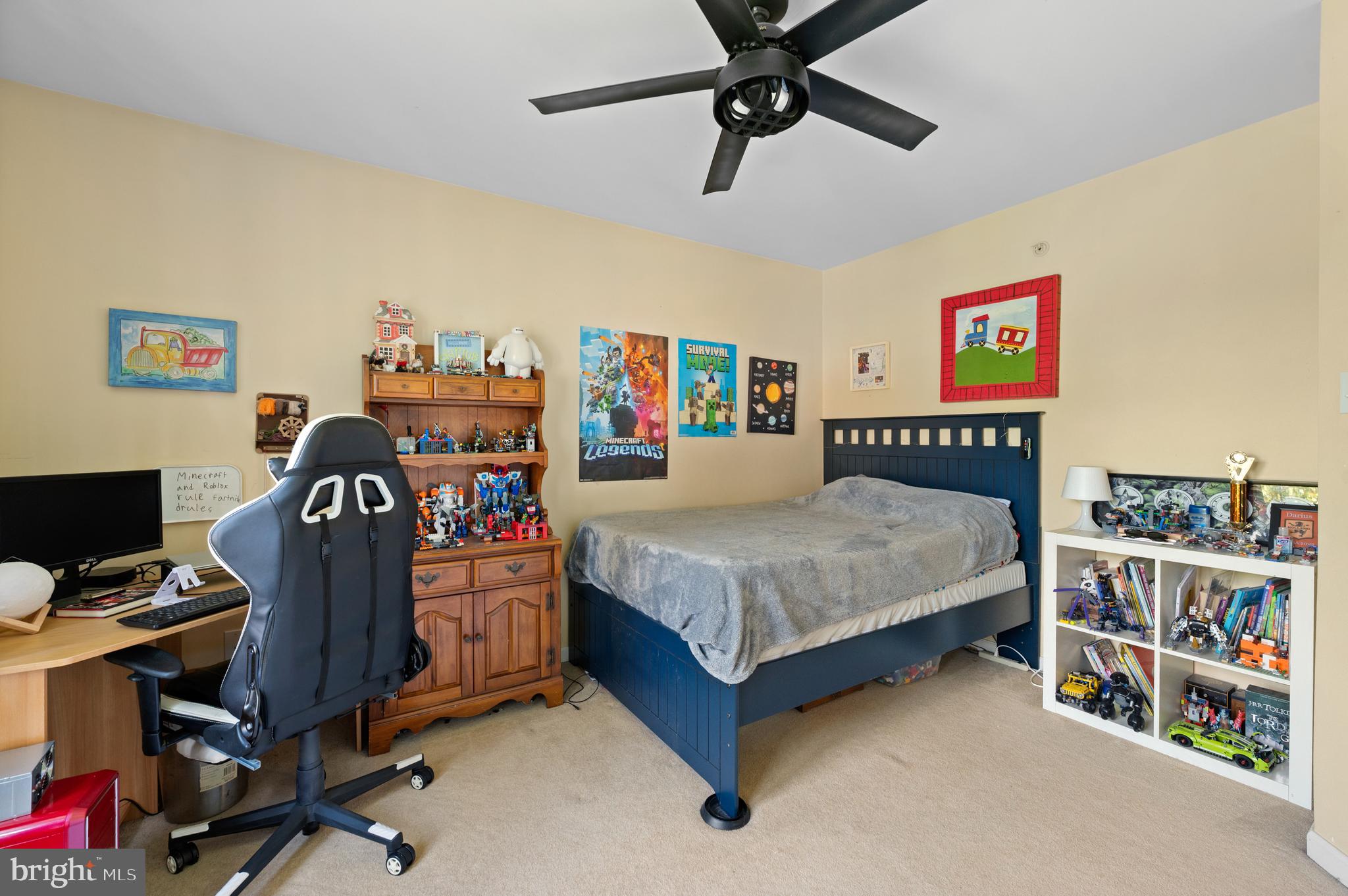 210 Main Street Newtown Square, PA 19073 - Photo 26 of 43 a bedroom with a bed and a desk