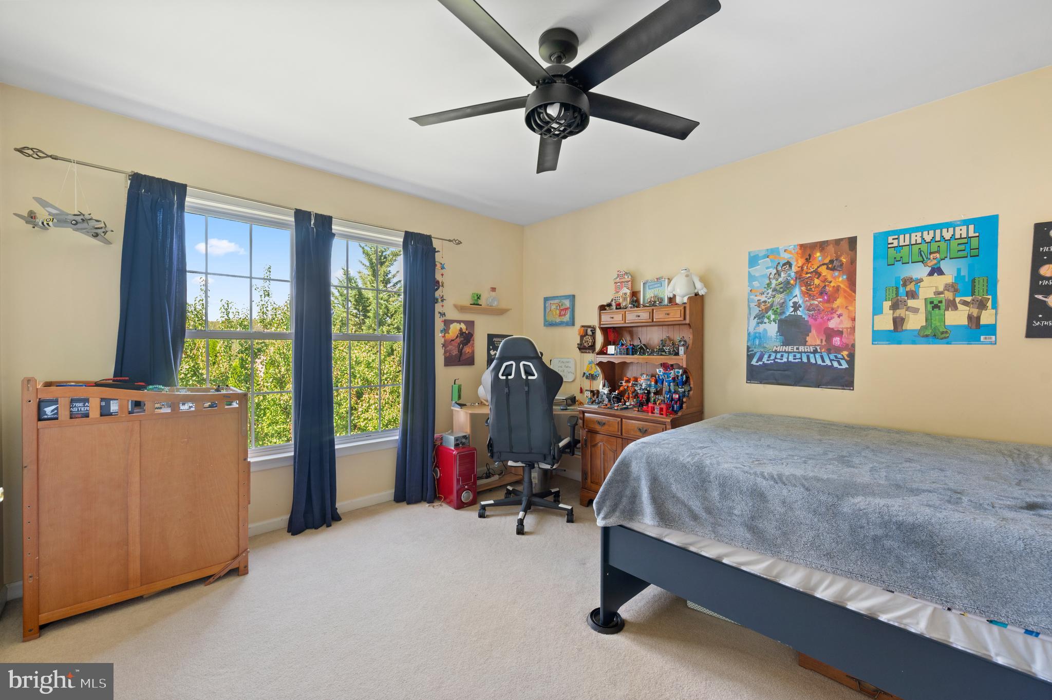 210 Main Street Newtown Square, PA 19073 - Photo 27 of 43 a bedroom with a bed and a large window