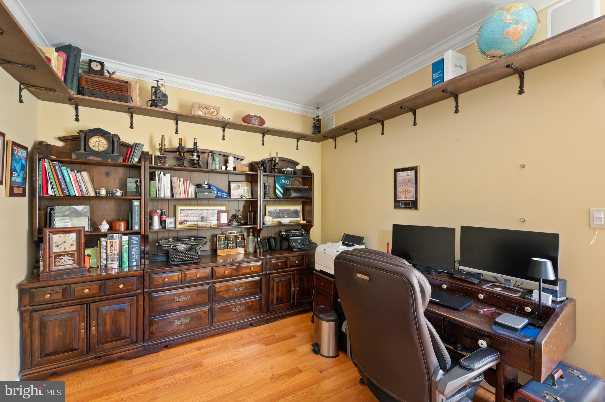 210 Main Street Newtown Square, PA 19073 - Photo 3 of 43 a view of workspace with bookshelf