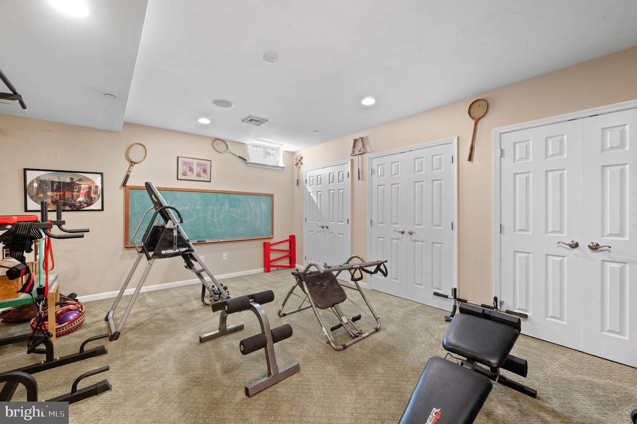 210 Main Street Newtown Square, PA 19073 - Photo 38 of 43 a room with gym equipment and a flat screen tv
