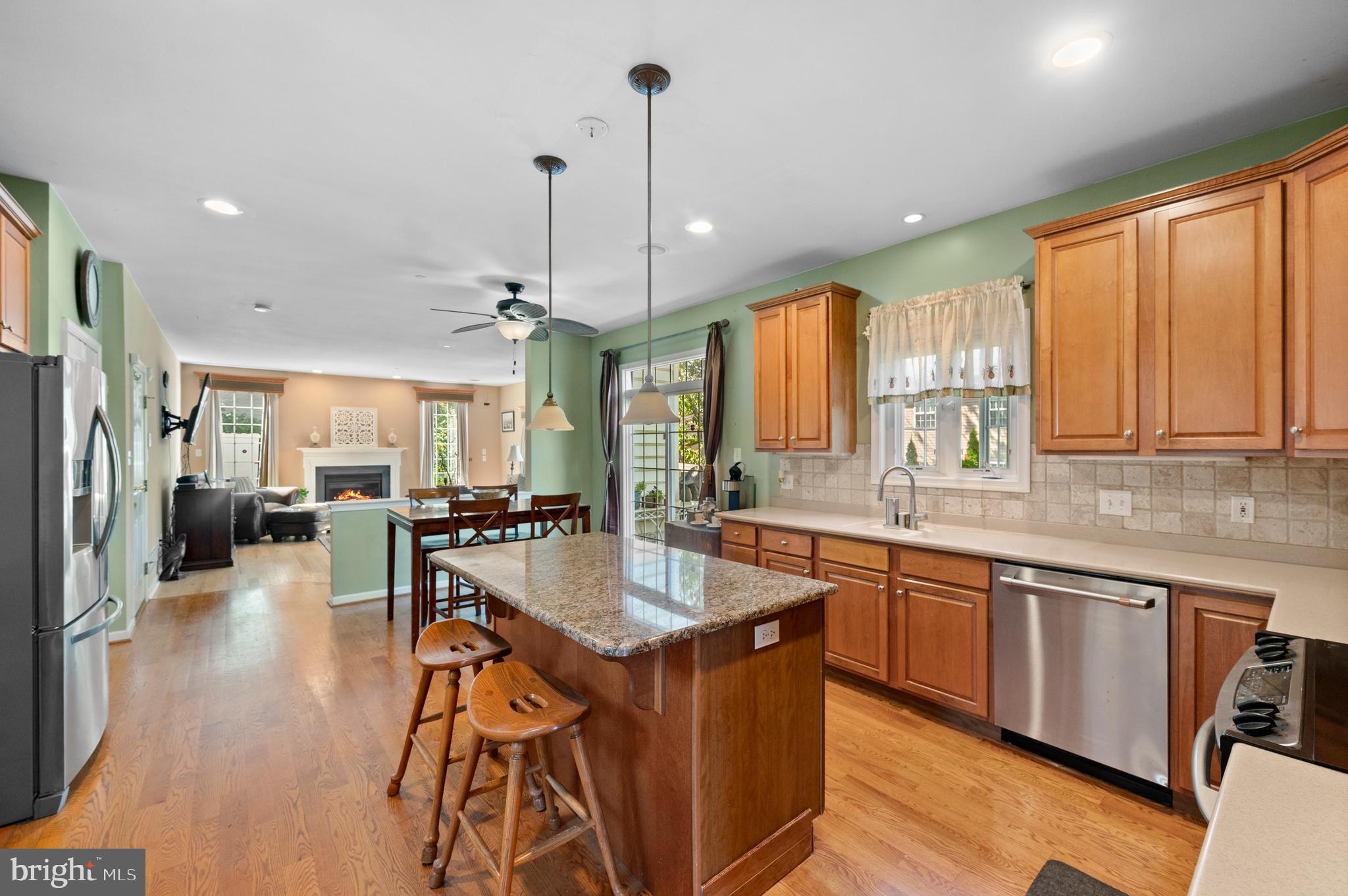 210 Main Street Newtown Square, PA 19073 - Photo 9 of 43 a large kitchen with lots of counter space a sink a window and stainless steel appliances