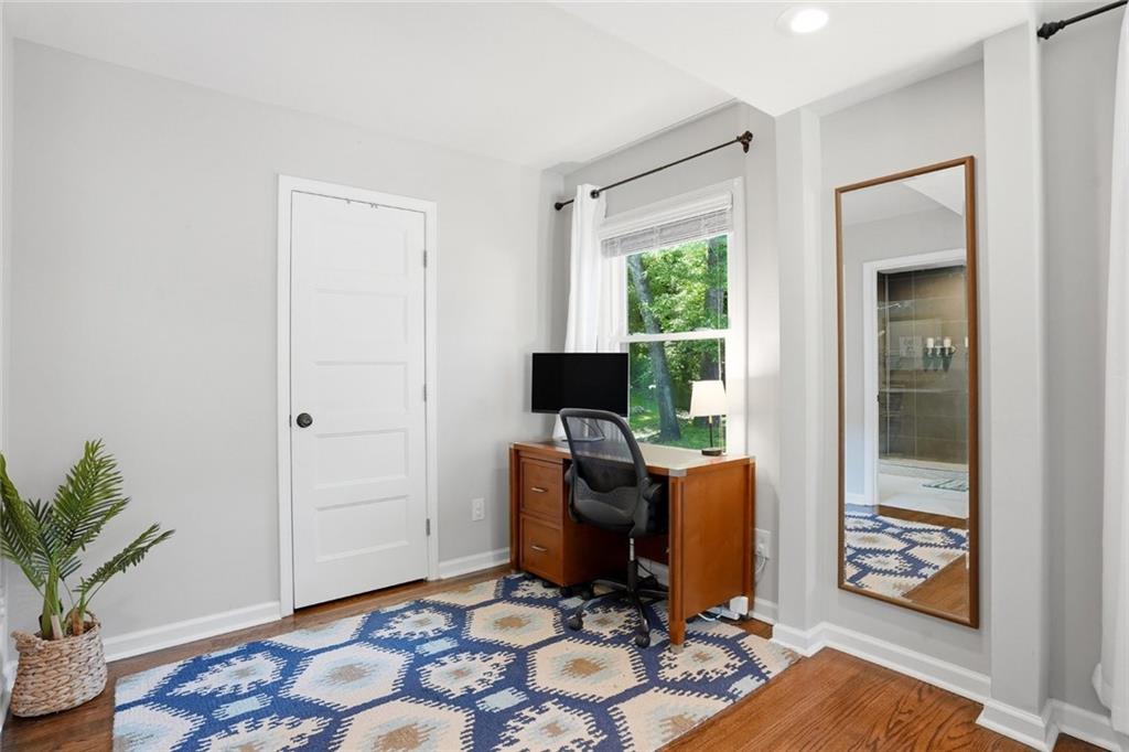 1430 Thomas Road Decatur, GA 30030 - Photo 17 of 42 a view of a workspace with furniture and a window