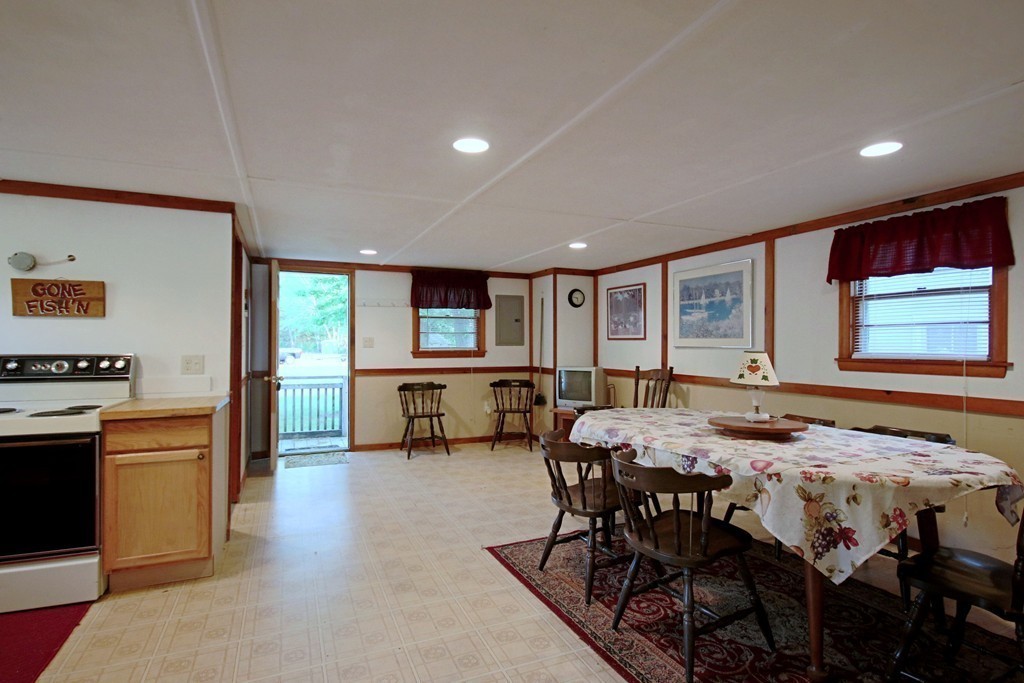 1 Bisson Lane Merrimac, MA 01860 - Photo 11 of 30 a view of a dining room with furniture and a kitchen