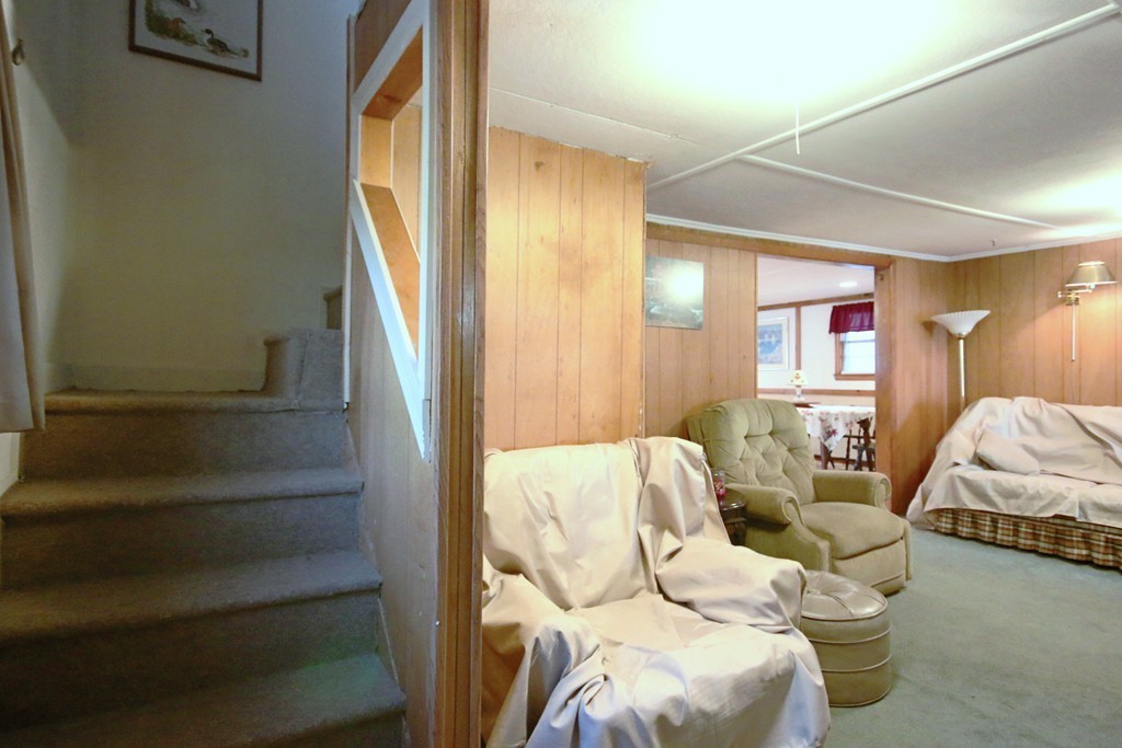 1 Bisson Lane Merrimac, MA 01860 - Photo 15 of 30 a living room with furniture and a window
