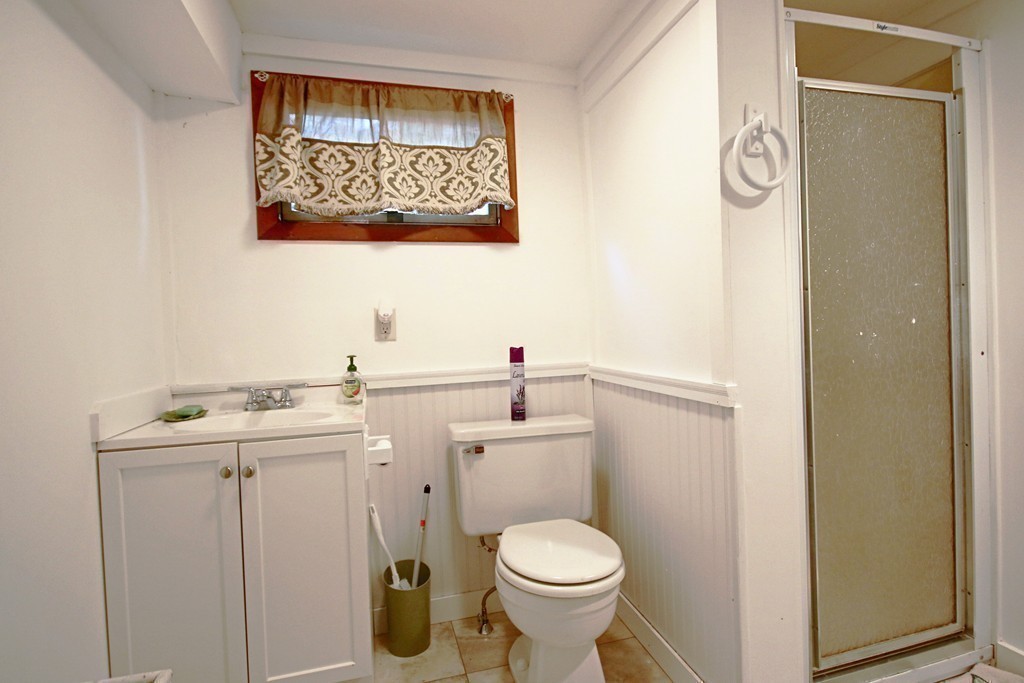 1 Bisson Lane Merrimac, MA 01860 - Photo 20 of 30 a bathroom with a toilet sink and mirror